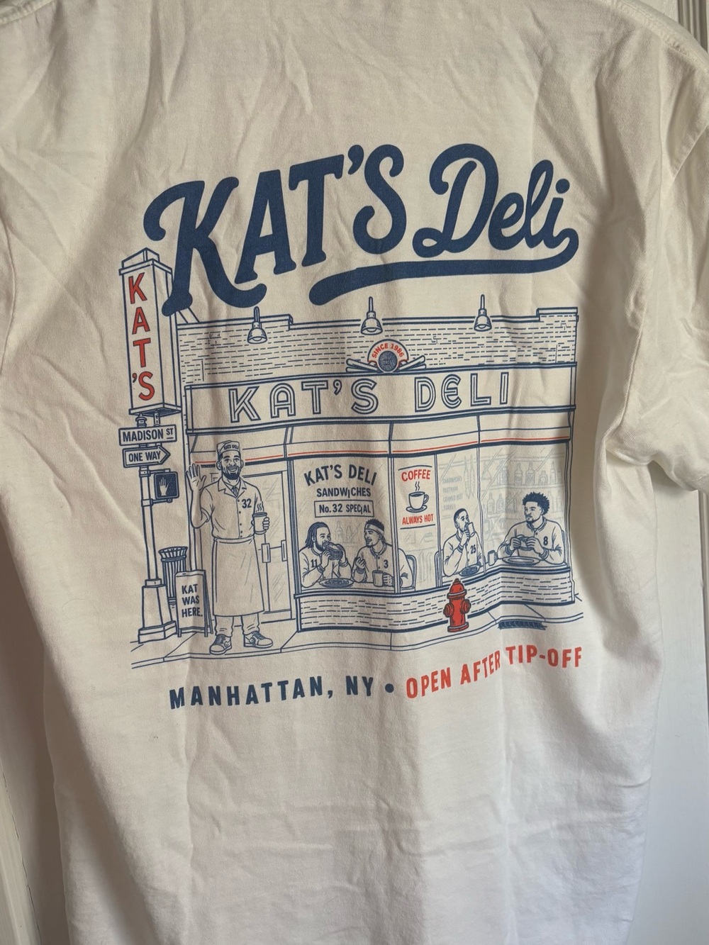 Comfort Colors Kat's Deli Graphic Tee in White with Blue & Red Accents